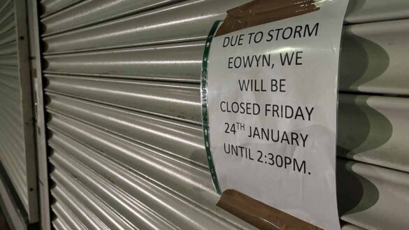 Storm Eowyn severe weather employers. Photo shows a shuttered up shop with a closure notice because of Storm Eowyn