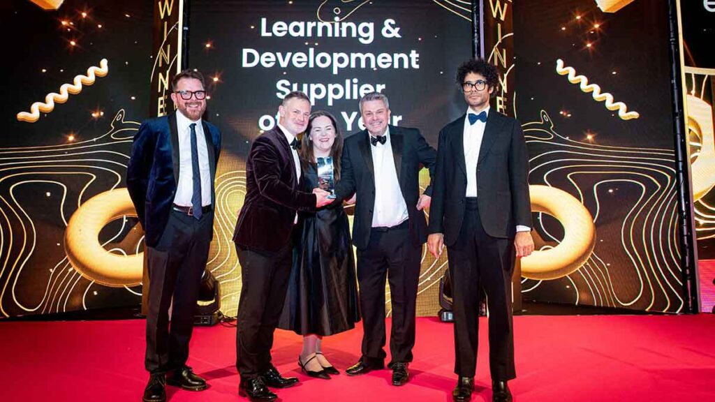 The team from escalla receive the L&D Supplier of the Year trophy at the Personnel Today Awards 2024