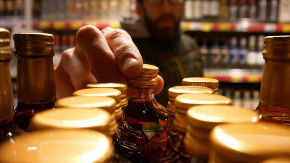 Air kiss did not constitute sexual harassment. Image shows whisky bottles in a shop.