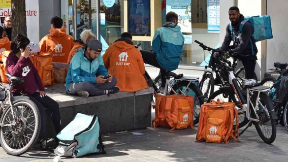 Deliveroo, Just East and Uber Eats riders outside a takeaway in Liverpool. Organisations including the TUC are calling for greater transparency around how their apps work.